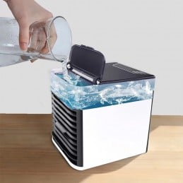 Mini Climatizzatore Portatile Multifunzione con Luce LED Un mini sistema di climatizzazione portatile, ideale per creare un ambiente piacevole, fresco e pulito.