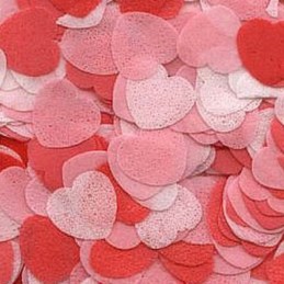 Muestra tu lado romántico y llena tus espacios del color del amor esparciendo estos apasionados confeti rojos en forma de corazón.