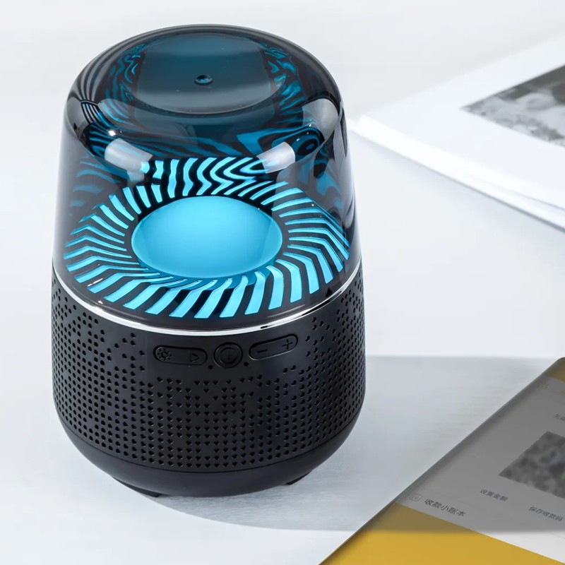 Bring your playlist to life with this fantastic Bluetooth Speaker and watch a show of colorful lights that move according to the rhythm.