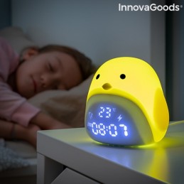 Eine taktile Digitaluhr in Form eines Kükens, die auch als Nachtlicht mit 3 Intensitätsstufen fungiert und Datum und Temperatur anzeigt.