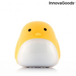 A tactile digital clock in the shape of a chick that also functions as a night light with 3 intensity levels and shows the date and temperature.