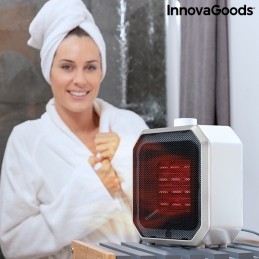 Um aquecedor portátil de cerâmica, que é muito cómodo e colocar em qualquer local e que fornece calor rápido e uniformemente por toda a divisão