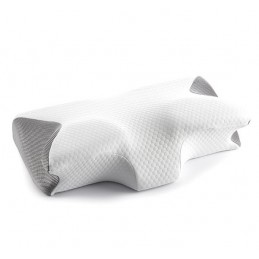 Un cuscino cervicale viscoelastico dai contorni ergonomici per un sostegno ottimale della testa, del collo e delle mani che aiuta a dormire nella postura più corretta.
